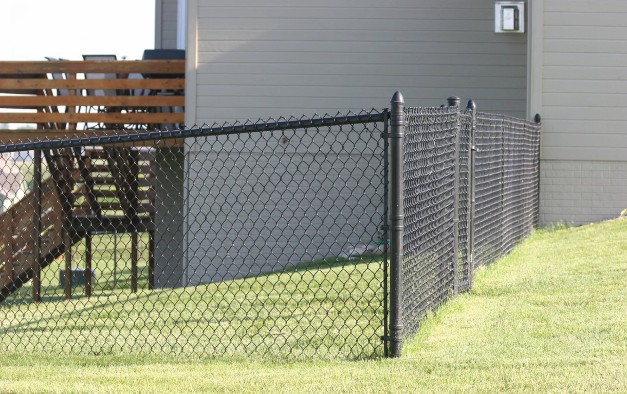 Durable chain-link fence installation for residential property security